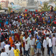 Protesters march near the scene of Saturday's massive truck bomb attack in Mogadishu, Somalia.